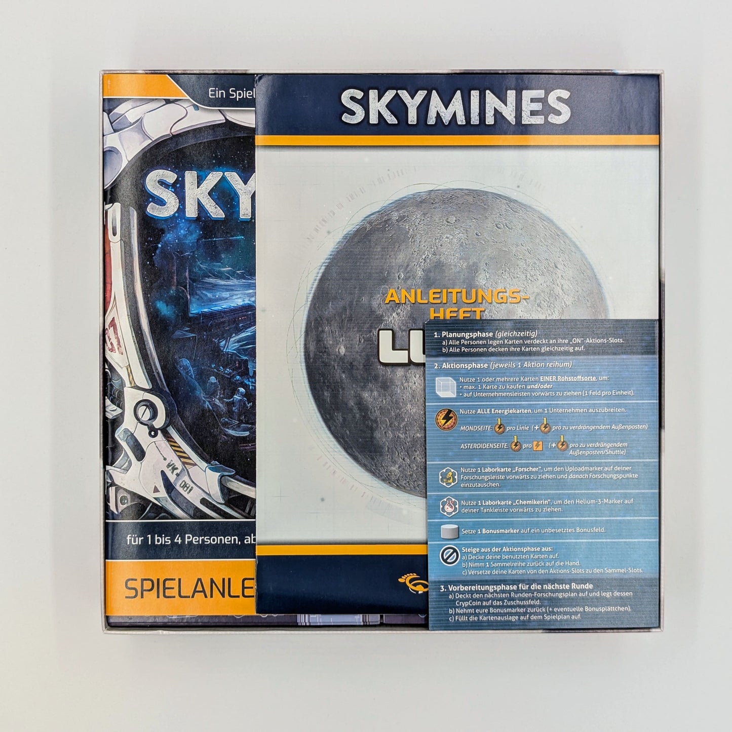 Skymines Insert, vollständig in der Spieleschachtel, inklusive Spielbrett, Spielertableau und Anleitung